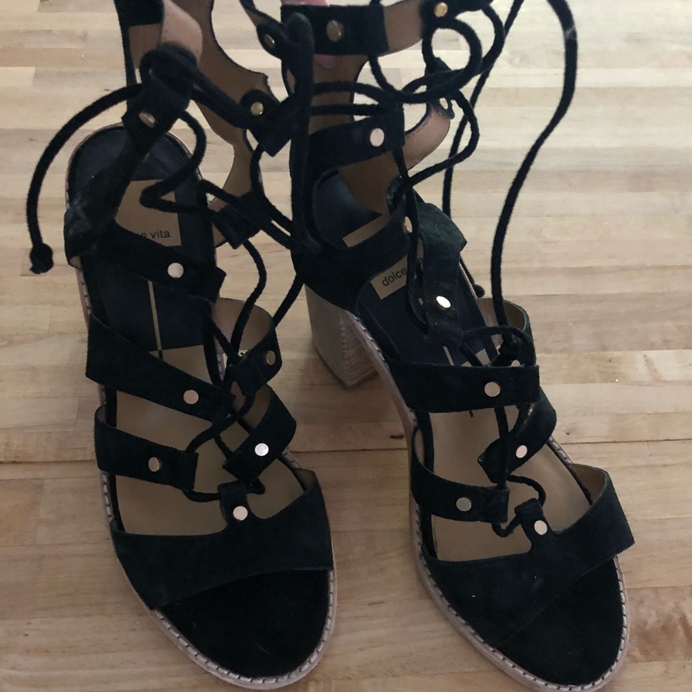 Strapped black heels. Worn a few times.